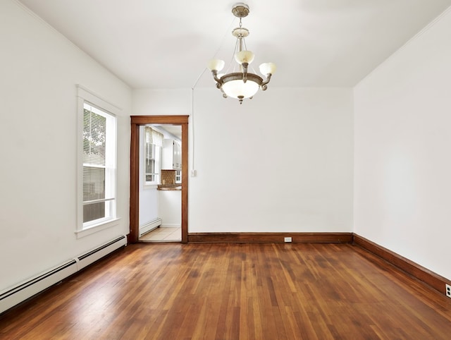 29 Cadwell Ave, Waverly, NY 14892 - unfurnished room featuring baseboard heating, a chandelier, wood finished floors, and baseboards