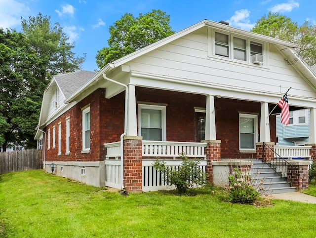 29 Cadwell Ave, Waverly, NY 14892 - bungalow with a porch, brick siding, and stairway
