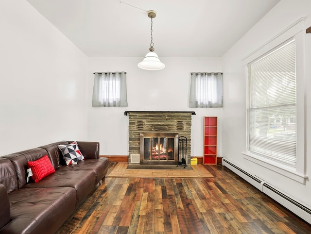 29 Cadwell Ave, Waverly, NY 14892 - living room with a baseboard heating unit, wood-type flooring, and healthy amount of natural light