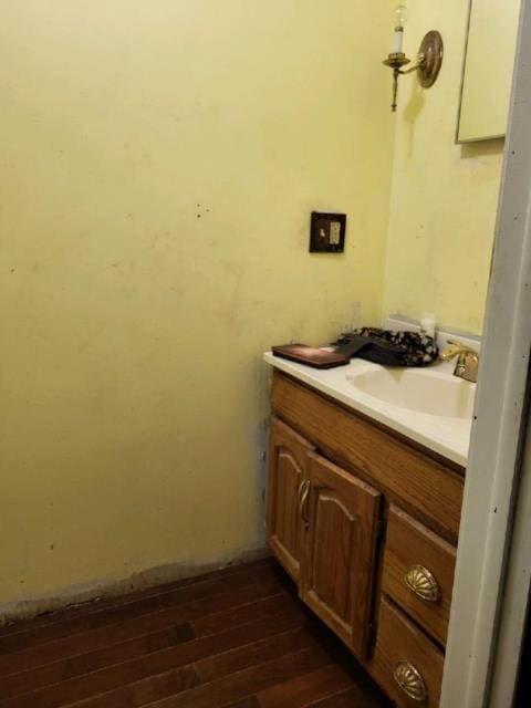 bathroom with vanity and hardwood / wood-style flooring