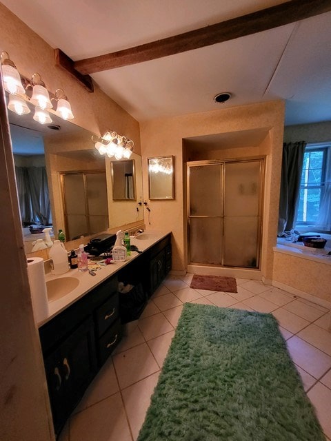 bathroom featuring tile patterned flooring, beam ceiling, and shower with separate bathtub