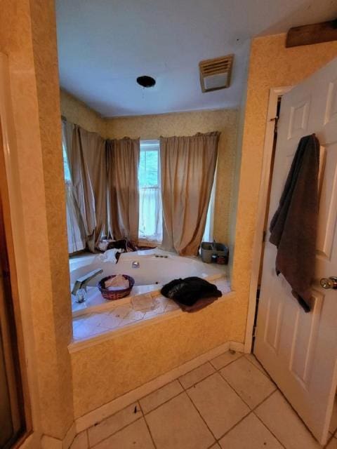 bathroom with tile patterned flooring