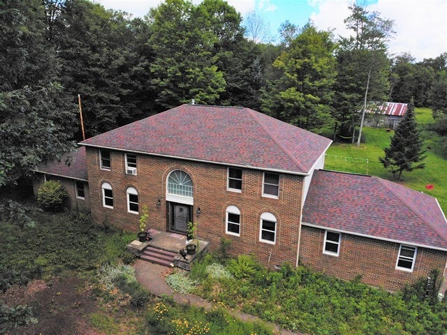 156 Hillcrest Dr, Coudersport, PA 16915 - kitchen featuring dark brown cabinetry and white gas range