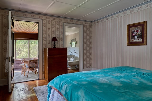 76 Front St, Owego, NY 13827 - bedroom with wallpapered walls, hardwood / wood-style floors, and access to exterior