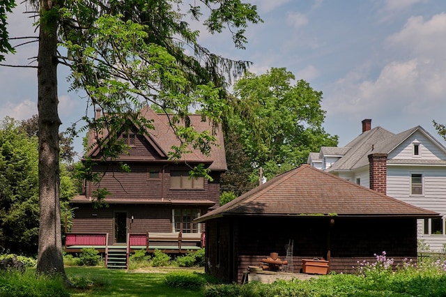 76 Front St, Owego, NY 13827 - view of home's exterior featuring a wooden deck and a yard