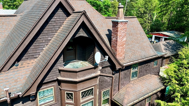 76 Front St, Owego, NY 13827 - exterior view of a chimney and a shingled roof