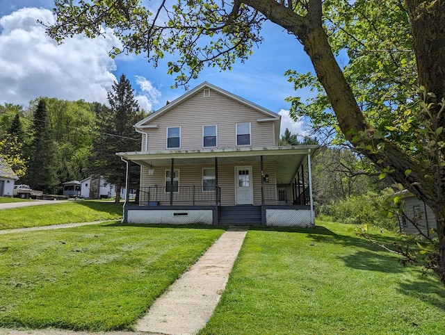 view of front facade featuring a porch and a front yard