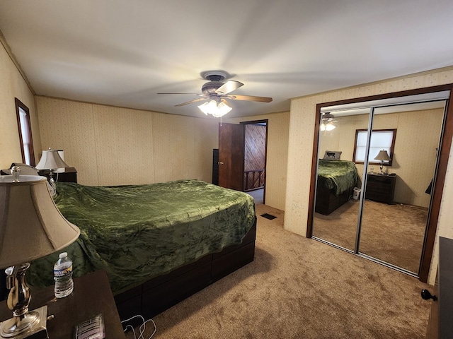 bedroom featuring ceiling fan and carpet flooring