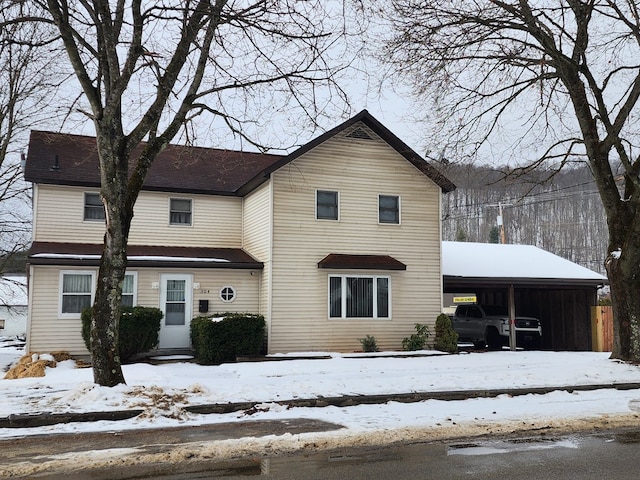 front of property with a carport