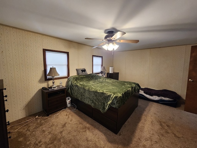 bedroom with ceiling fan and carpet flooring