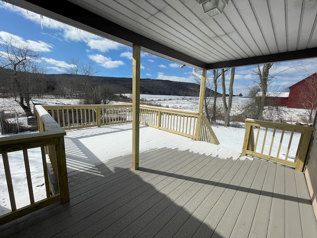 view of snow covered deck