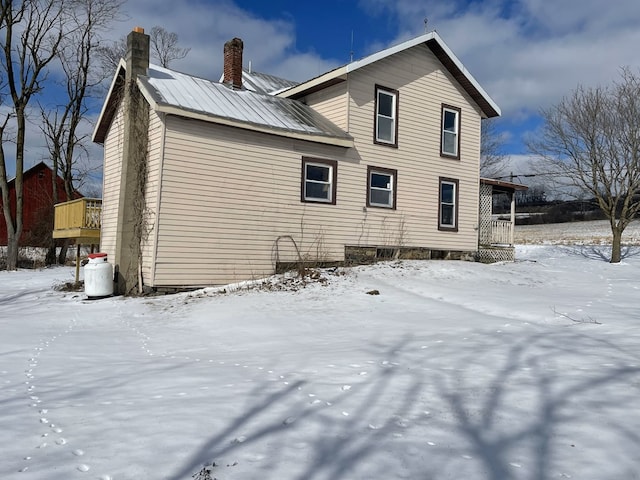 view of snow covered property