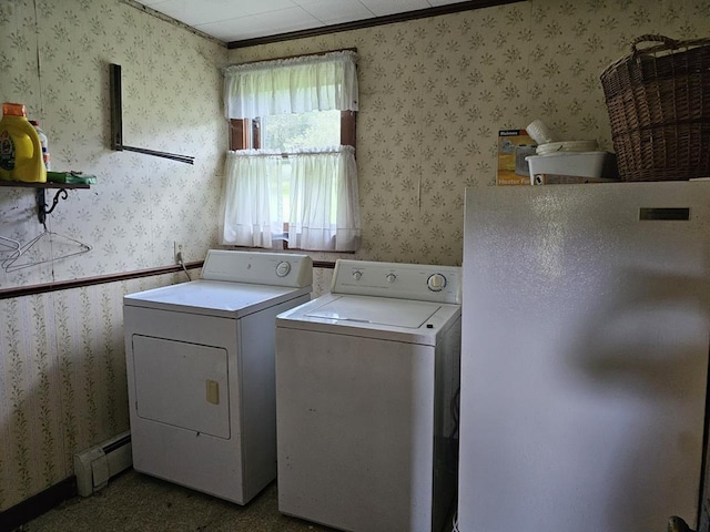 laundry area with separate washer and dryer, a baseboard radiator, and ornamental molding