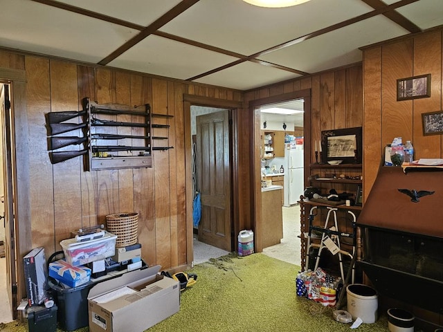 interior space with wooden walls and carpet