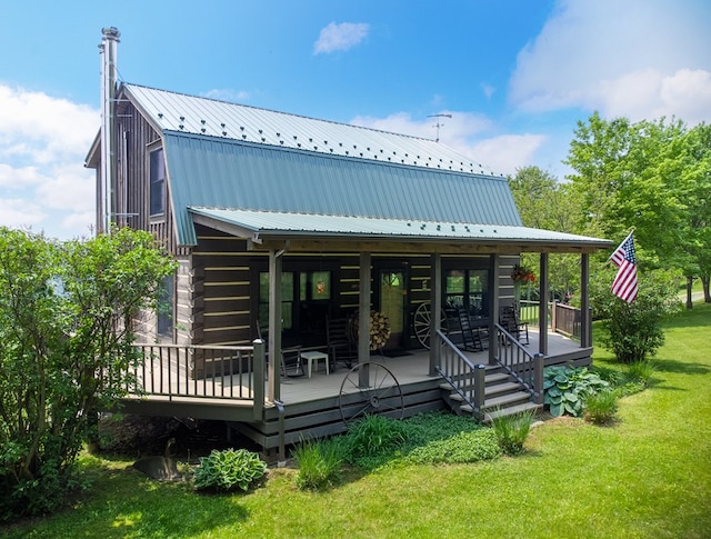 436 Teeter Rd, Genesee, PA 16923 - back of house with a lawn, a metal roof, a gambrel roof, log siding, and a wooden deck