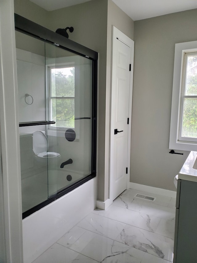 1750 Bailey Creek Rd, Millerton, PA 16936 - full bath with vanity, baseboards, combined bath / shower with glass door, marble look tiles, and toilet