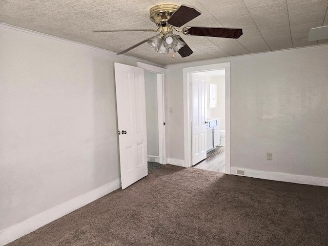 526 Stevenson St, Sayre, PA 18840 - carpeted spare room with baseboards, a textured ceiling, and ceiling fan