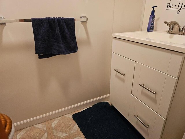 516 Dutch Hill Rd, Coudersport, PA 16915 - bathroom featuring baseboards and vanity