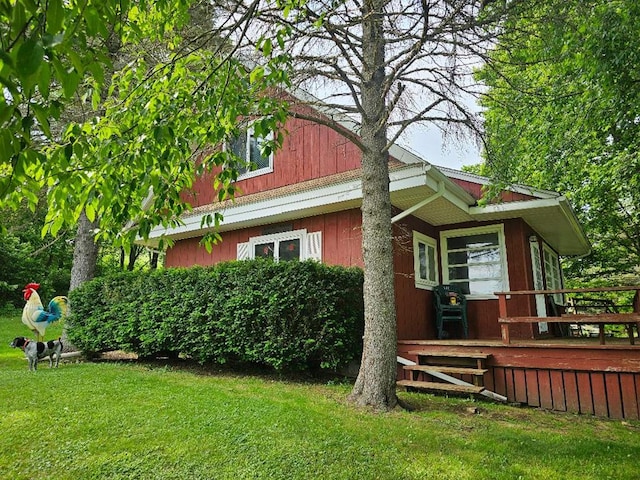 516 Dutch Hill Rd, Coudersport, PA 16915 - view of side of home featuring a wooden deck and a lawn