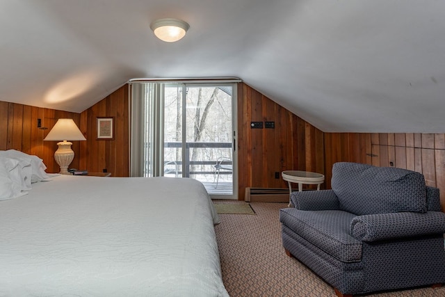 carpeted bedroom with wood walls, a baseboard radiator, and vaulted ceiling