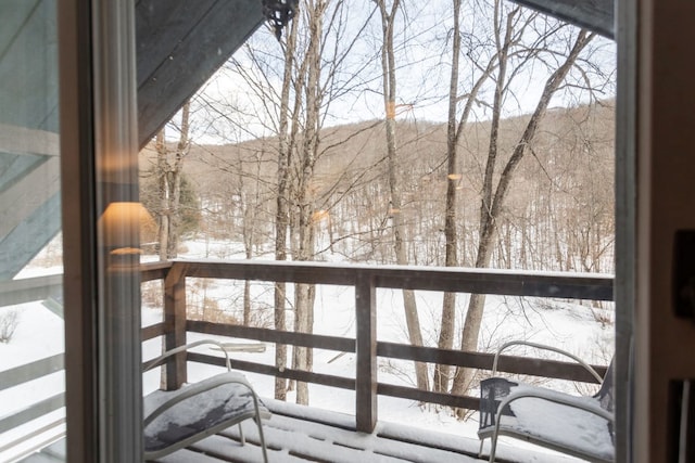 view of snow covered deck