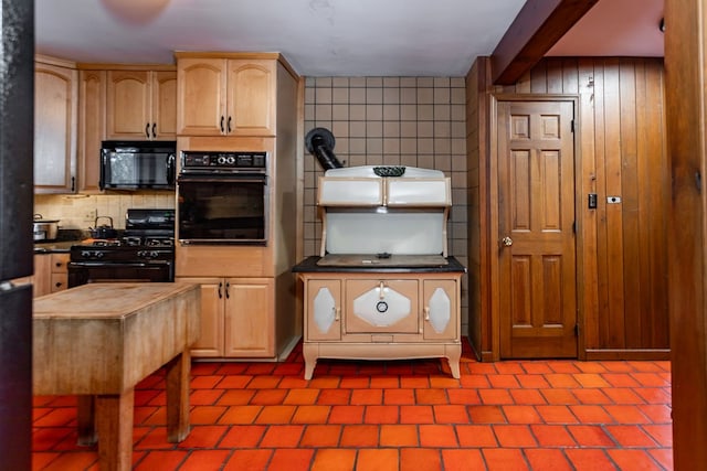 kitchen featuring beam ceiling, backsplash, light brown cabinetry, and black appliances