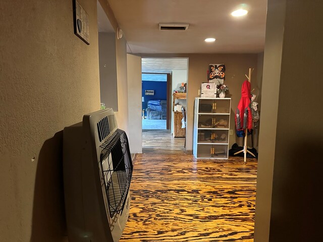146 Academy St, Genesee, PA 16923 - hall featuring a textured wall, heating unit, wood finished floors, and recessed lighting