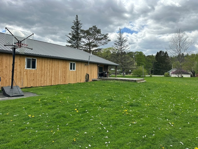 146 Academy St, Genesee, PA 16923 - rear view of property featuring a lawn and metal roof