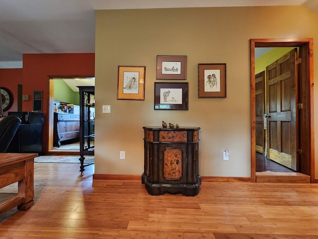 hallway featuring light hardwood / wood-style floors