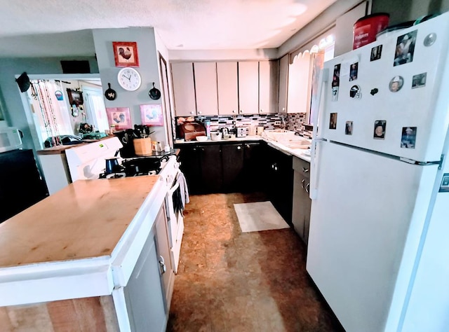 2756 Austinville Rd, Troy, PA 16947 - kitchen featuring white appliances, light countertops, and backsplash