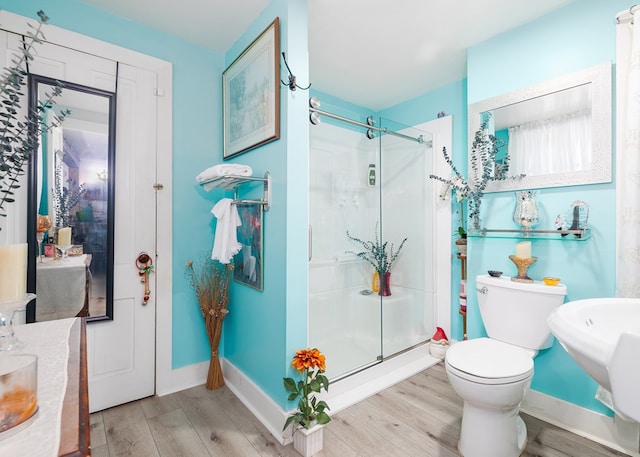 1503 Stewart Rd, Addison, NY 14801 - full bathroom with wood finished floors, a stall shower, and baseboards