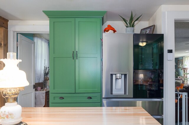 1503 Stewart Rd, Addison, NY 14801 - kitchen featuring green cabinets, stainless steel refrigerator with ice dispenser, and wooden counters