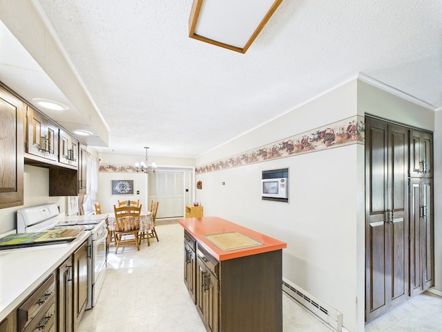 1041 Rte 44, Shinglehouse, PA 16748 - kitchen featuring white electric stove, baseboard heating, a textured ceiling, light countertops, and light floors