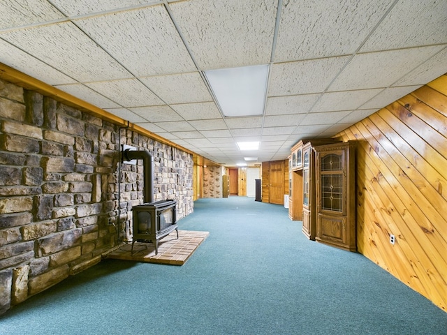 1041 Rte 44, Shinglehouse, PA 16748 - finished below grade area with a wood stove, carpet flooring, a drop ceiling, and wood walls