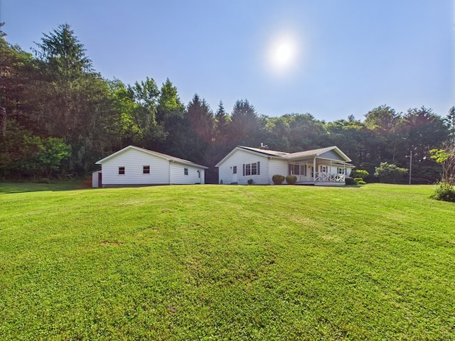 1041 Rte 44, Shinglehouse, PA 16748 - rear view of house featuring a lawn and a porch