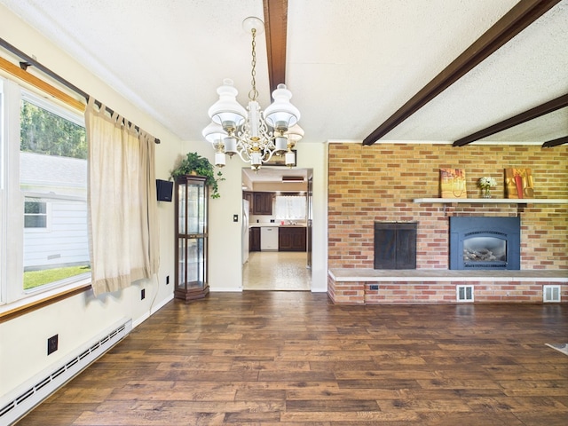 1041 Rte 44, Shinglehouse, PA 16748 - unfurnished living room featuring baseboard heating, wood finished floors, a chandelier, a brick fireplace, and plenty of natural light