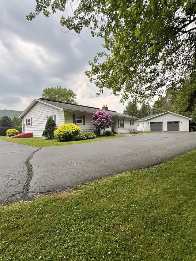 1041 Rte 44, Shinglehouse, PA 16748 - view of front facade with a garage and a front yard