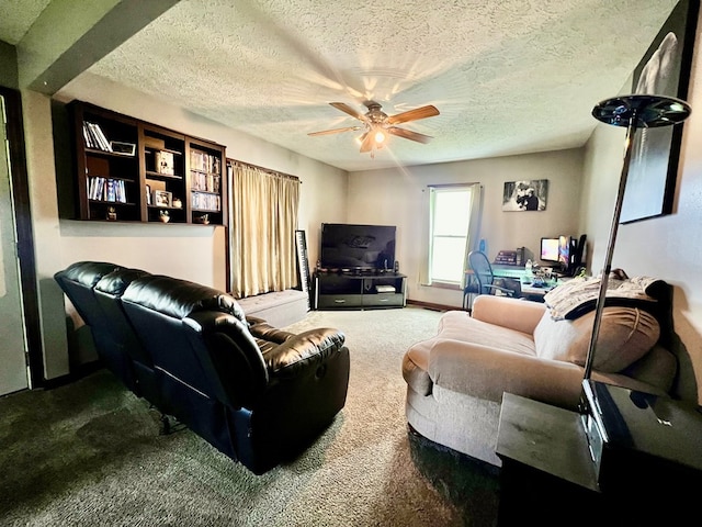 carpeted living room with ceiling fan and a textured ceiling