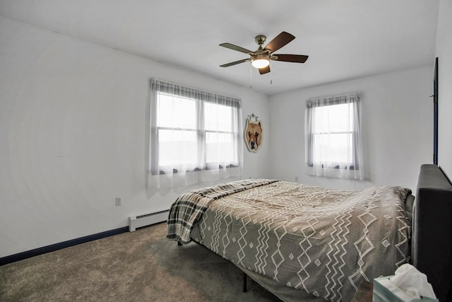 667 Ostrom Hill Rd, Liberty, PA 16930 - carpeted bedroom with a baseboard radiator, baseboards, and ceiling fan