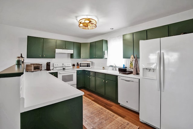 667 Ostrom Hill Rd, Liberty, PA 16930 - kitchen with white appliances, green cabinetry, dark wood-type flooring, and a sink