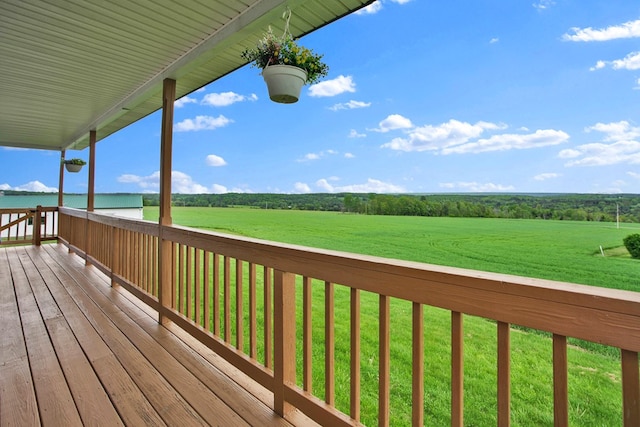 667 Ostrom Hill Rd, Liberty, PA 16930 - wooden terrace featuring a lawn and a view of countryside
