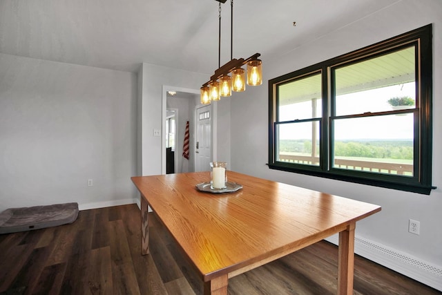 667 Ostrom Hill Rd, Liberty, PA 16930 - dining room featuring a baseboard radiator, dark wood finished floors, and baseboards