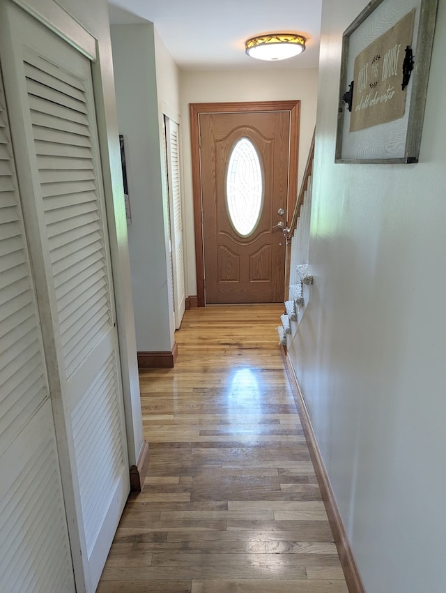 doorway to outside featuring light hardwood / wood-style flooring