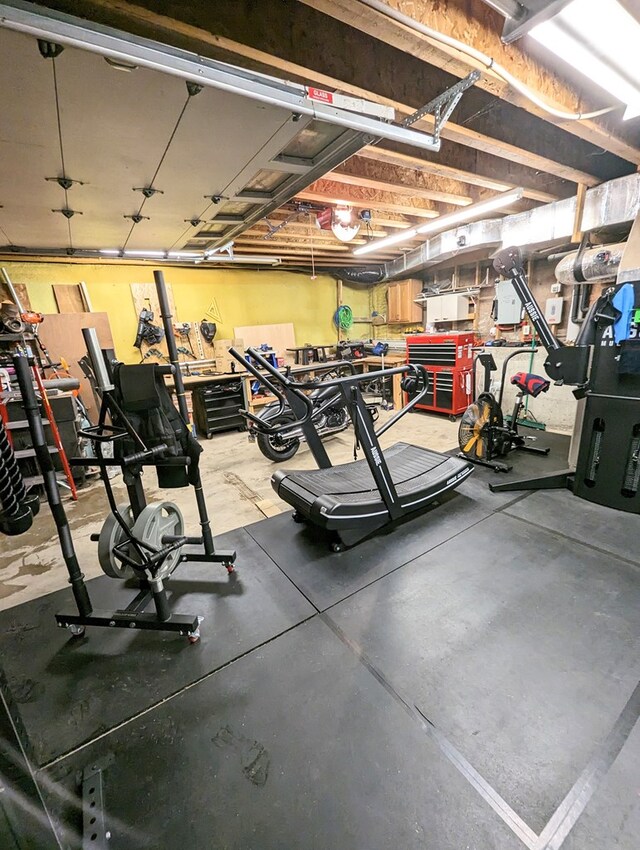 workout area with a workshop area