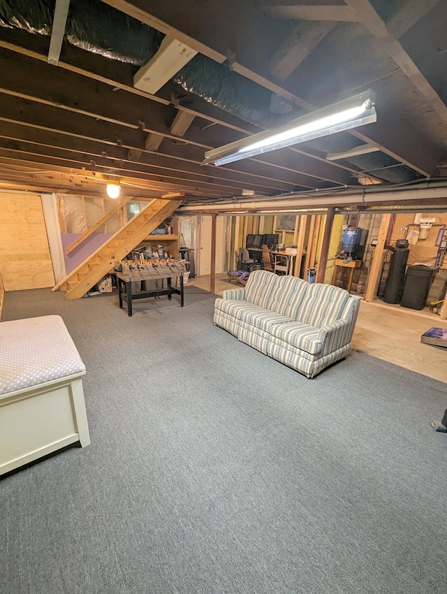 basement featuring carpet flooring