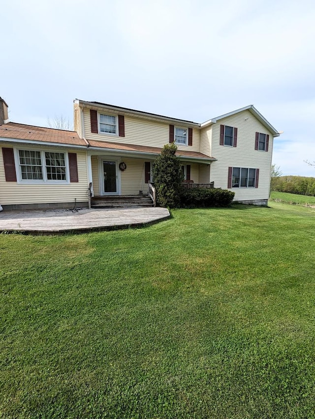 view of front of property with a front lawn