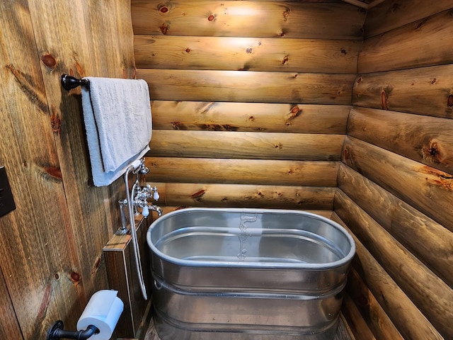 bathroom with log walls