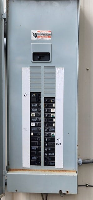 utility room with electric panel