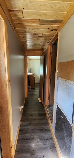 hallway with wooden ceiling and dark wood-type flooring