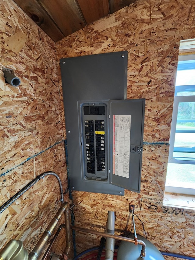 utility room with electric panel